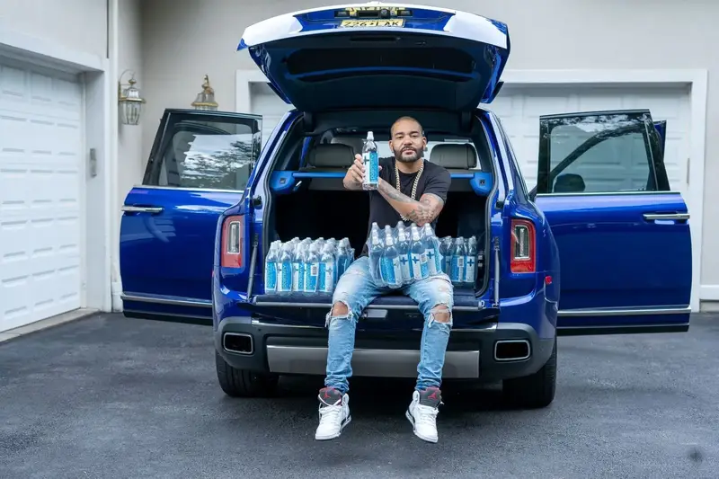 Positivity Alkaline Water bottles with the brand’s retail launch campaign